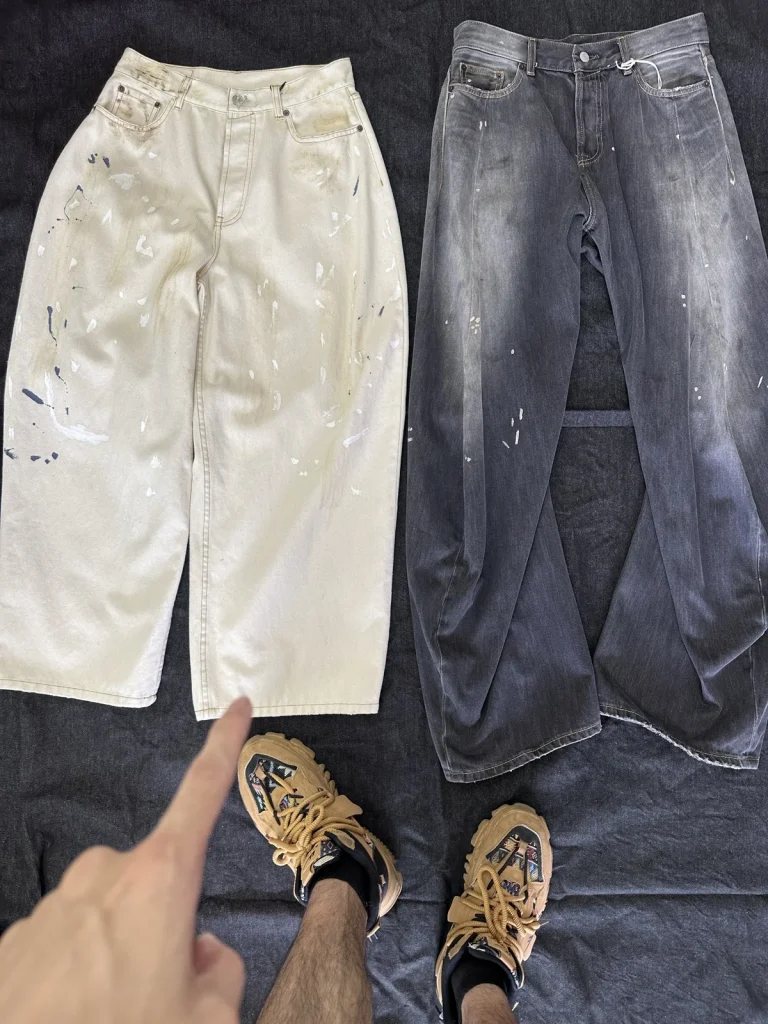 Light and dark trousers with scattered surface decoration.