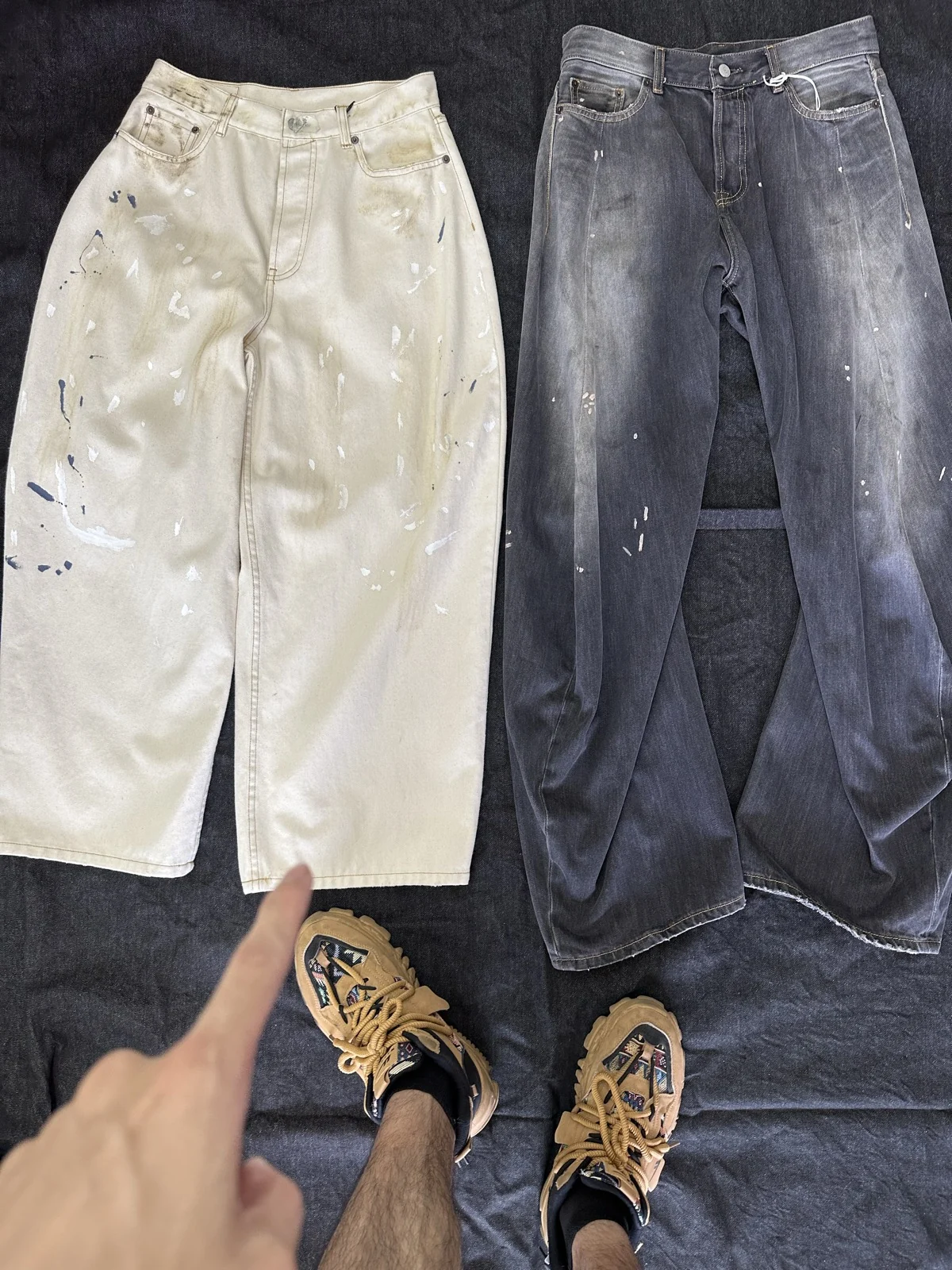 Light and dark trousers with scattered surface decoration.
